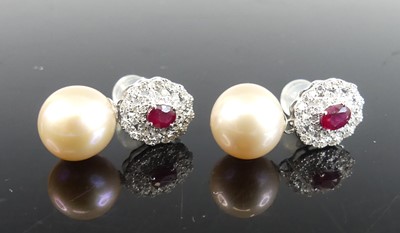 Lot 2327 - A pair of white metal, pearl, ruby and diamond...
