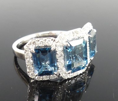 Lot 2356 - A 9ct white gold, blue topaz and diamond...