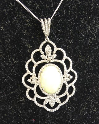 Lot 2301 - A white metal opal and diamond openwork...