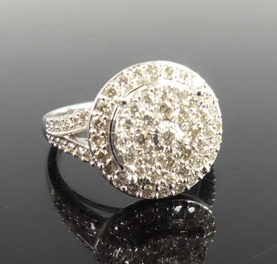 Lot 2329 - A 9ct gold diamond circular cluster ring,...