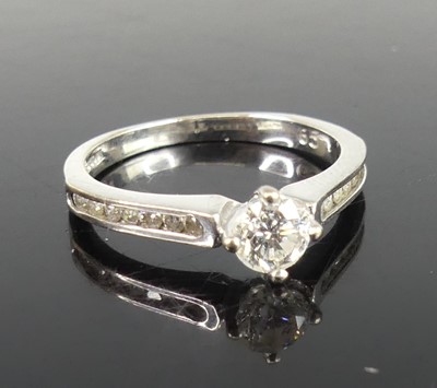 Lot 2287 - An 18ct white gold diamond solitaire ring,...