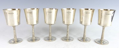 Lot 107 - A set of six 1970s silver goblets, each with...