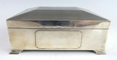 Lot 100 - An Art Deco silver table cigar box, the engine...