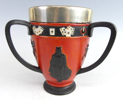 Lot 2 - An unusual Doulton Lambeth pottery footed tyg,...