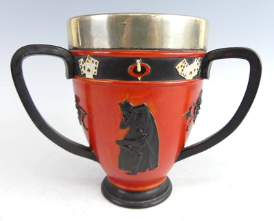 Lot 2 - An unusual Doulton Lambeth pottery footed tyg,...