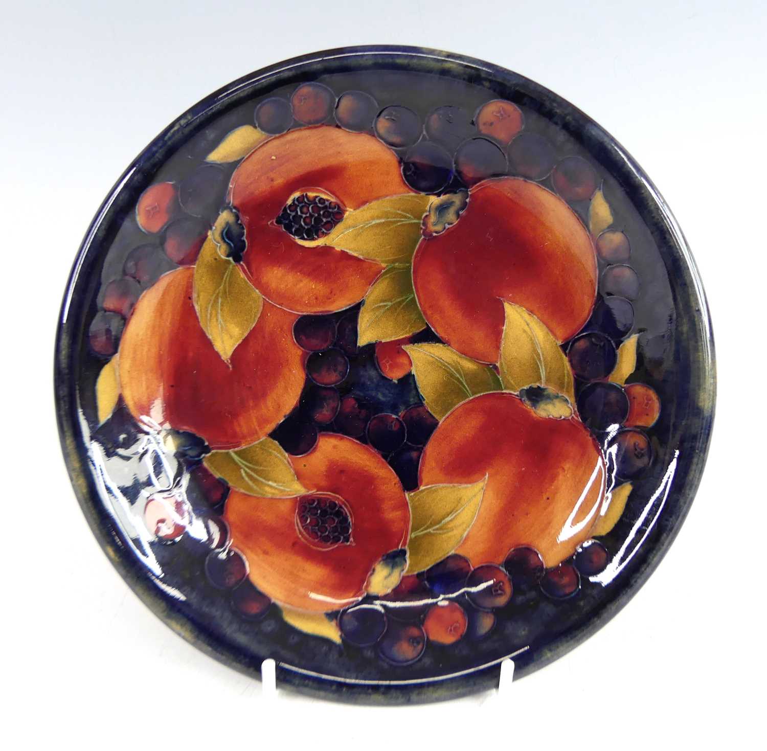 Lot 28 - A Moorcroft pottery circular dish in the...