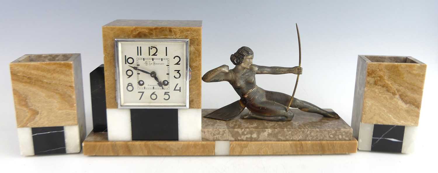 Lot 9 - A French Art Deco variegated marble clock...