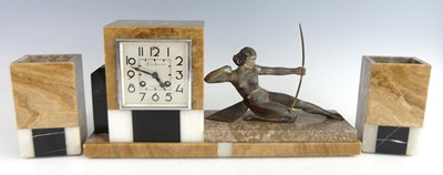 Lot 153 - A French Art Deco variegated marble clock...