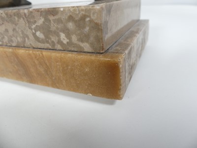 Lot 9 - A French Art Deco variegated marble clock...