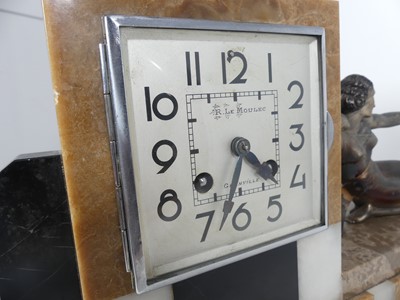Lot 9 - A French Art Deco variegated marble clock...