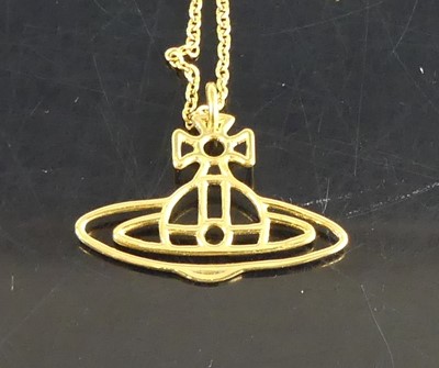 Lot 136 - Vivienne Westwood - a yellow metal Orb pendant,...