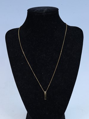 Lot 358 - A new 9ct gold and diamond point set pendant,...