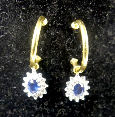 Lot 2539 - A pair of new 18ct gold sapphire and diamond...