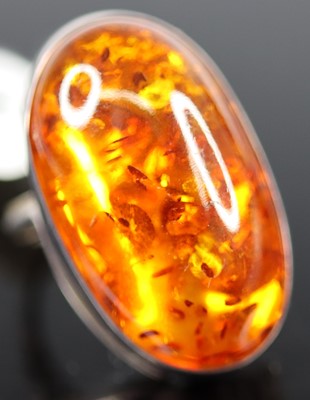 Lot 339 - A contemporary silver and cabochon amber set...