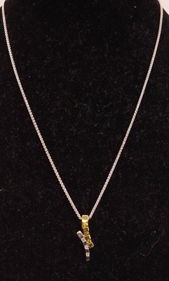 Lot 262 - A new 9ct yellow and white gold, tourmaline...