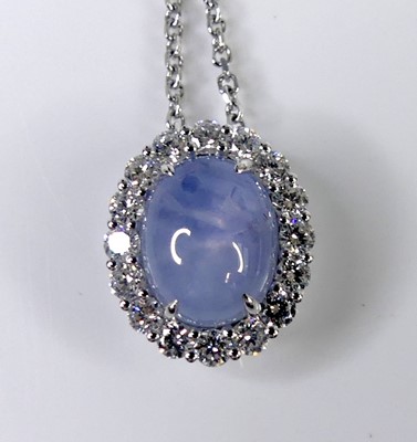 Lot 2532 - A new 18ct white gold, star sapphire and...