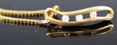 Lot 384 - A new 18ct gold diamond point set pendant,...