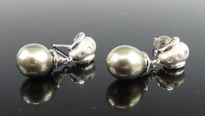 Lot 2249 - A pair of 18ct white gold, cultured black...