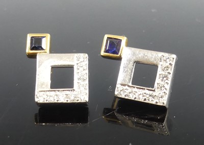Lot 2283 - A pair of 18ct yellow and white gold, sapphire...