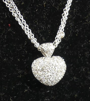 Lot 2323 - An 18ct white gold diamond heart...