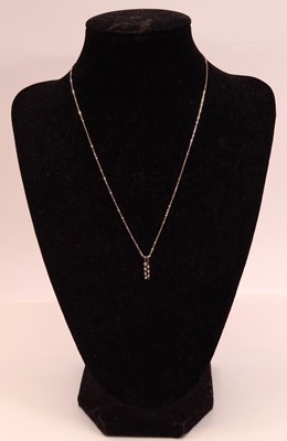 Lot 263 - A new 18ct white gold diamond pendant, diamond...