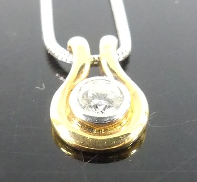 Lot 2300 - An 18ct rose and white gold diamond stirrup...
