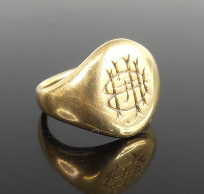 Lot 2266 - A lady's 9ct gold oval signet ring, engraved...