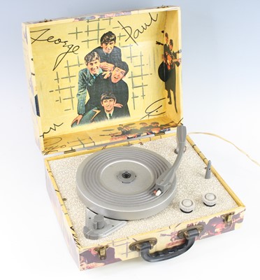 Lot 1443 - The Beatles, a four speed portable record...