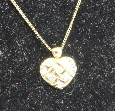 Lot 2282 - An 18ct yellow gold and diamond latticework...