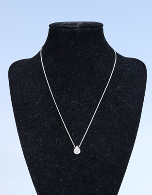 Lot 360 - A new 9ct white gold pear shaped pendant, pavé...
