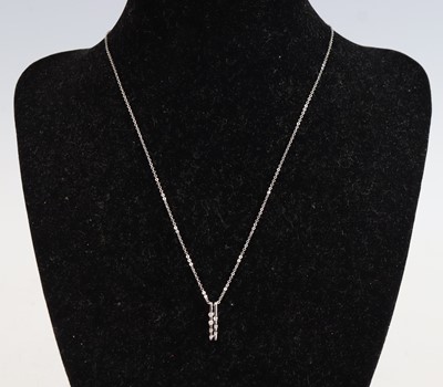 Lot 328 - A new 18ct white gold diamond set two-bar...