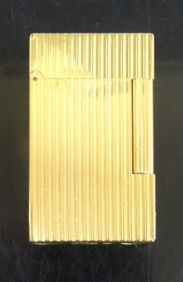 Lot 138 - S.T. Dupont of Paris - a gold plated pocket...