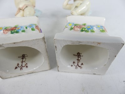 Lot 2046 - A pair of 18th century porcelain figures of...