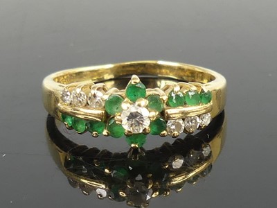 Lot 346 - A yellow and white metal, emerald and diamond...