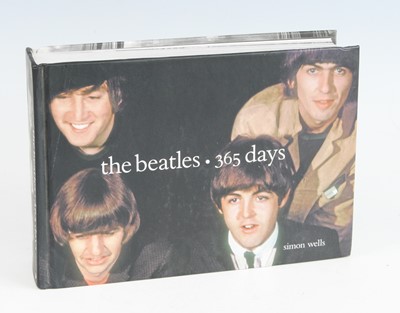 Lot 1261 - The Beatles - a collection of hardback books...
