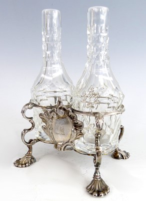 Lot 2208 - An early George III silver oil bottle table...