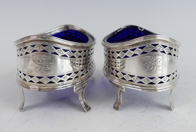 Lot 2111 - A pair of George III silver table salts, each...