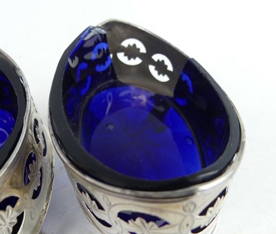 Lot 2111 - A pair of George III silver table salts, each...