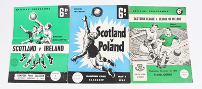 Lot 1554 - A collection of football programmes dating...