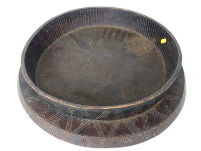 Lot 83 - An African carved wooden ceremonial platter,...