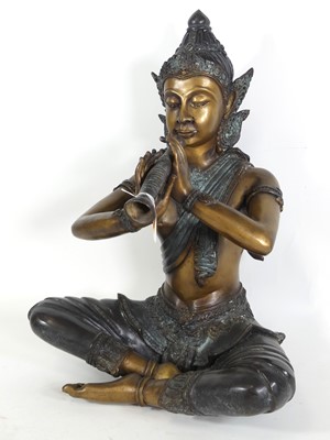 Lot 108 - A contemporary Thai bronze temple figure,...