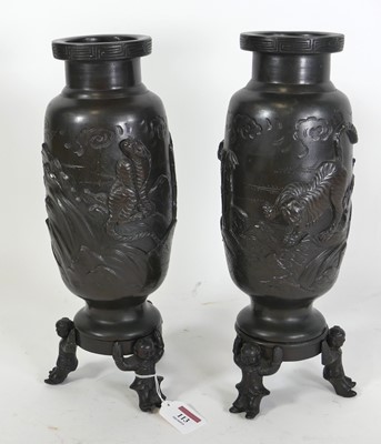 Lot 113 - A pair of Japanese bronze vases, decorated in...