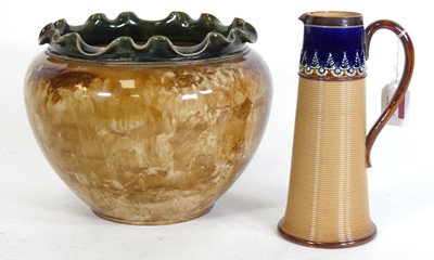 Lot 111 - A Royal Doulton stoneware jug, with tube-line...