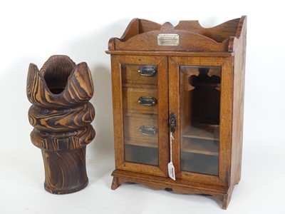 Lot 116 - An early 20th century oak smokers cabinet,...