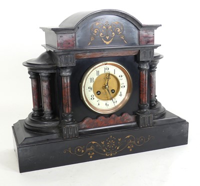 Lot 119 - A late 19th century black slate and rouge...