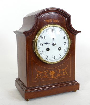 Lot 123 - An Edwardian walnut and marquetry inlaid...