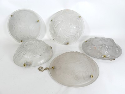 Lot 128 - A group of five various frosted moulded glass...