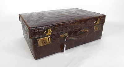Lot 140 - An early 20th century brown alligator skin...