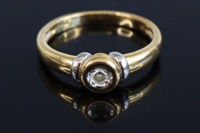 Lot 308 - A modern 18ct gold diamond solitaire ring, the...