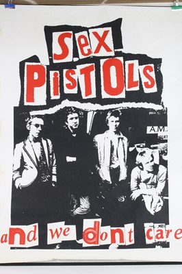 Lot 1322 - The Sex Pistols - And We Don't Care poster,...